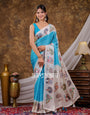 Vantara Turquoise Blue Satin Chiffon Printed Saree with Elephant & Peacock Heritage Print, Designer Tassel Pallu & Matching Blouse Piece