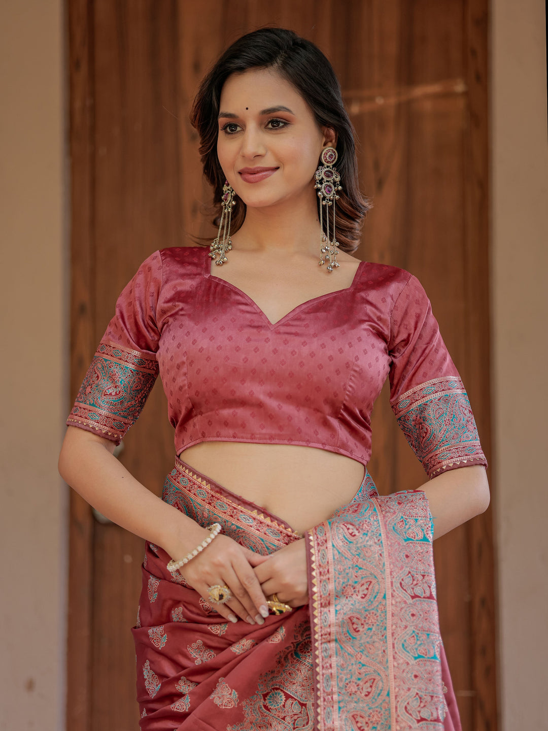 Dusty Rose Pink Banarasi Silk Saree with Intricate Paisley Zari Weaving & Tassel Detailing
