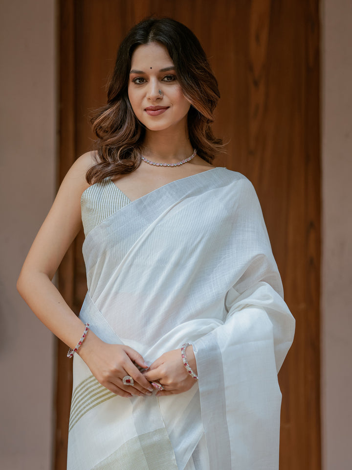 Pure White & Olive Green Handloom Cotton Saree with Minimal Striped Border & Tassel Detailing