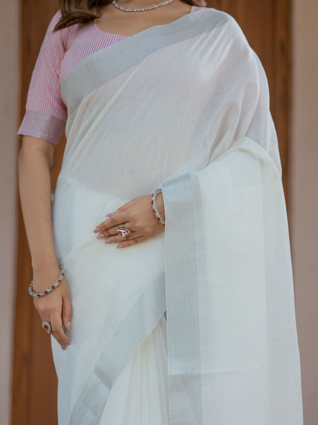Pure White & Blush Pink Handloom Cotton Saree with Minimal Striped Border & Tassel Detailing