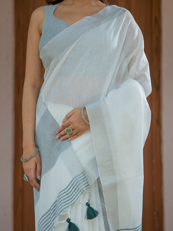 Pure White & Teal Blue Handloom Cotton Saree with Minimal Striped Border & Tassel Detailing