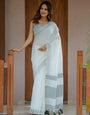 Pure White & Teal Blue Handloom Cotton Saree with Minimal Striped Border & Tassel Detailing