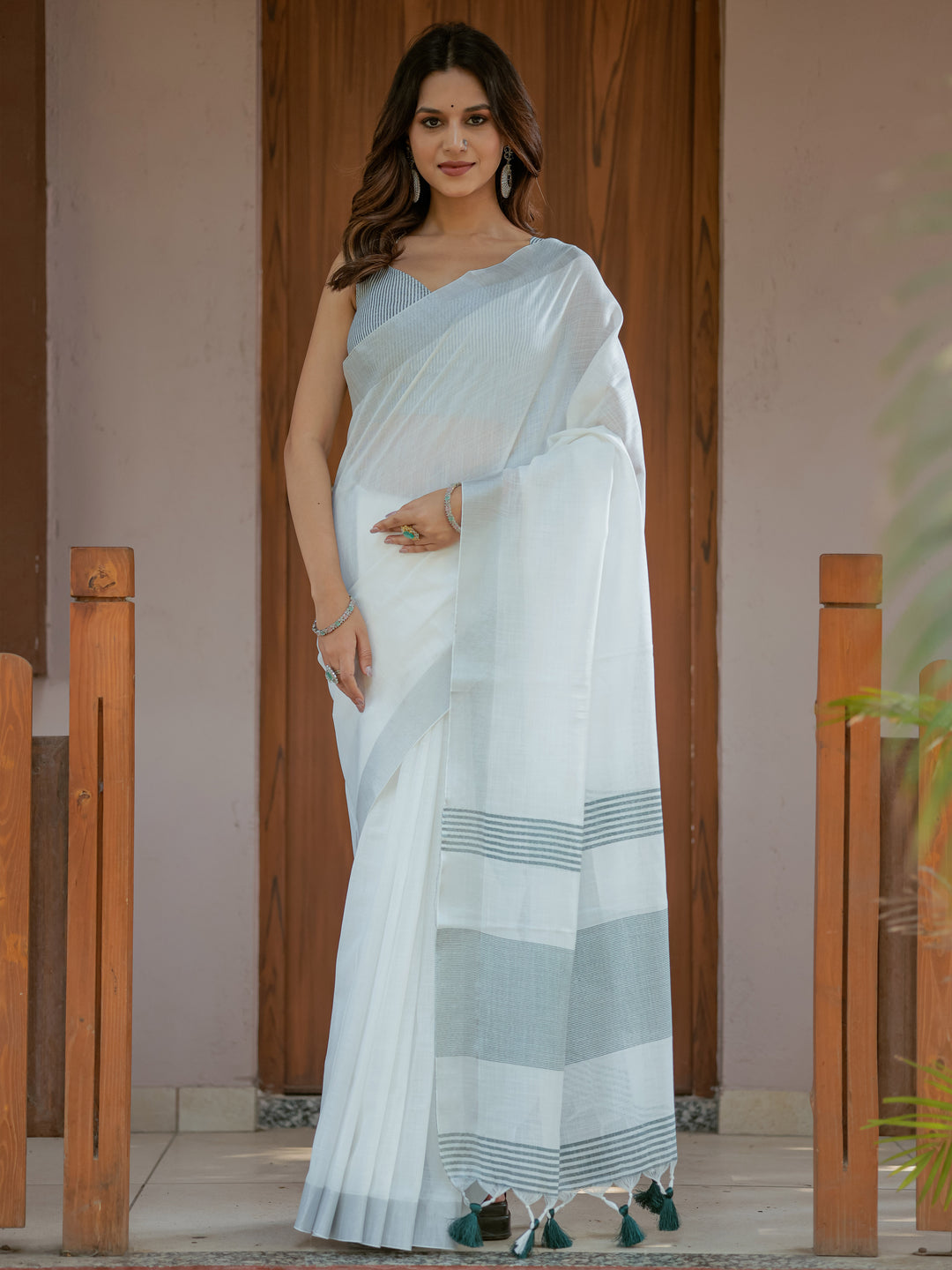 Pure White & Teal Blue Handloom Cotton Saree with Minimal Striped Border & Tassel Detailing