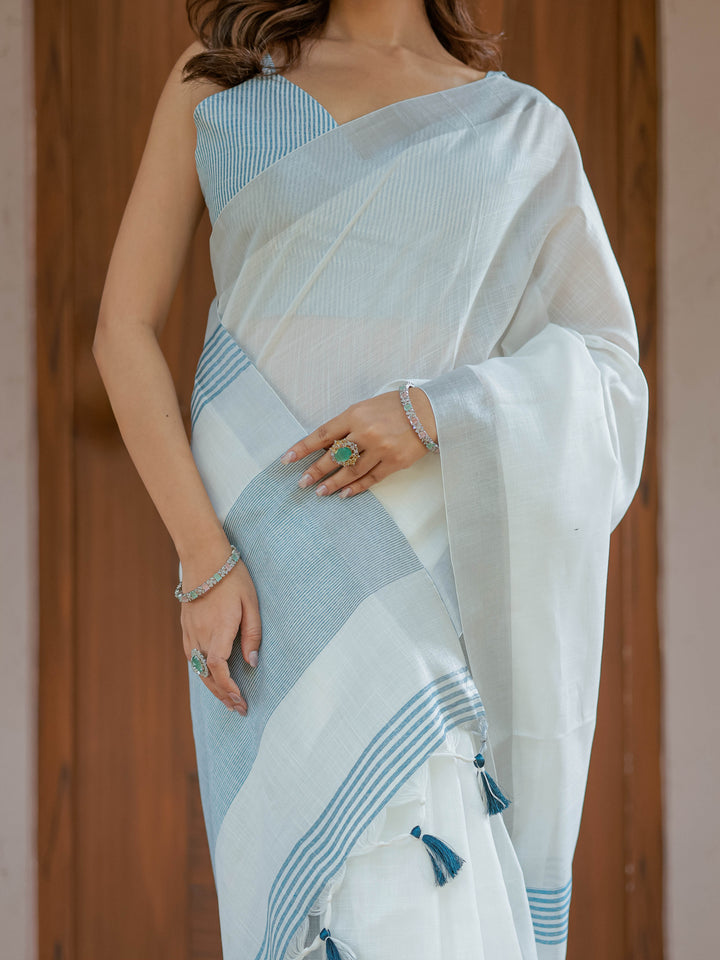 Pure White & Sky Blue Handloom Cotton Saree with Minimal Striped Border & Tassel Detailing
