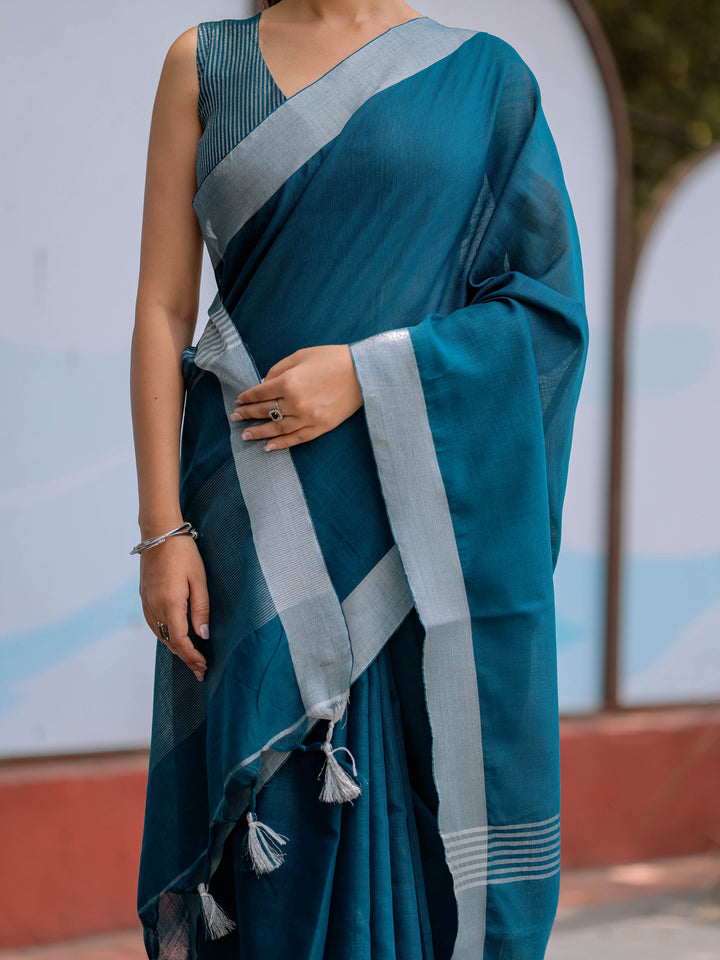 Elegant Teal Blue Pure Handloom Cotton Saree with Silver Border & Tassel Detailing