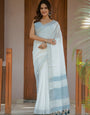 Pure White & Sky Blue Handloom Cotton Saree with Minimal Striped Border & Tassel Detailing