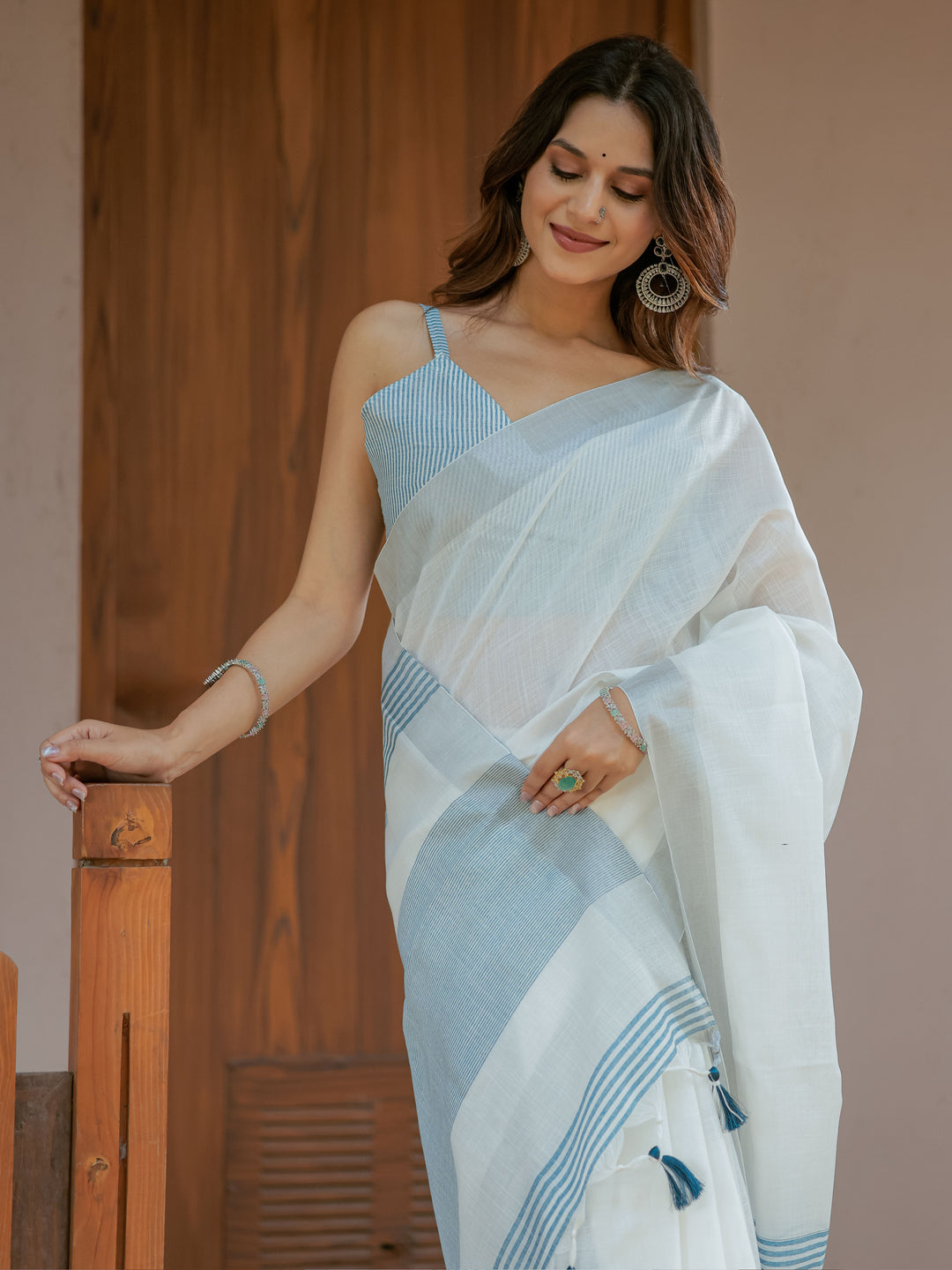 Pure White & Sky Blue Handloom Cotton Saree with Minimal Striped Border & Tassel Detailing