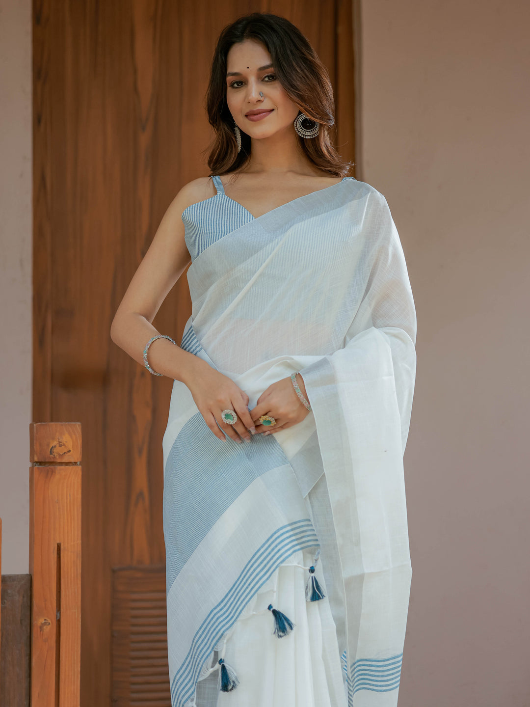 Pure White & Sky Blue Handloom Cotton Saree with Minimal Striped Border & Tassel Detailing