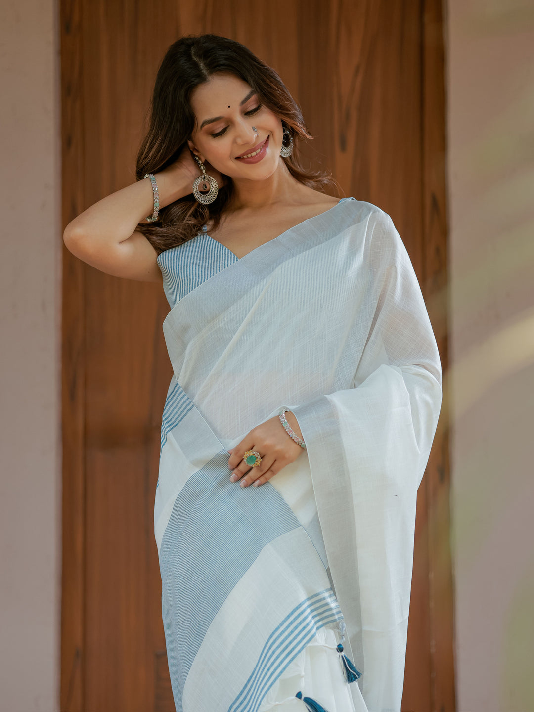 Pure White & Sky Blue Handloom Cotton Saree with Minimal Striped Border & Tassel Detailing