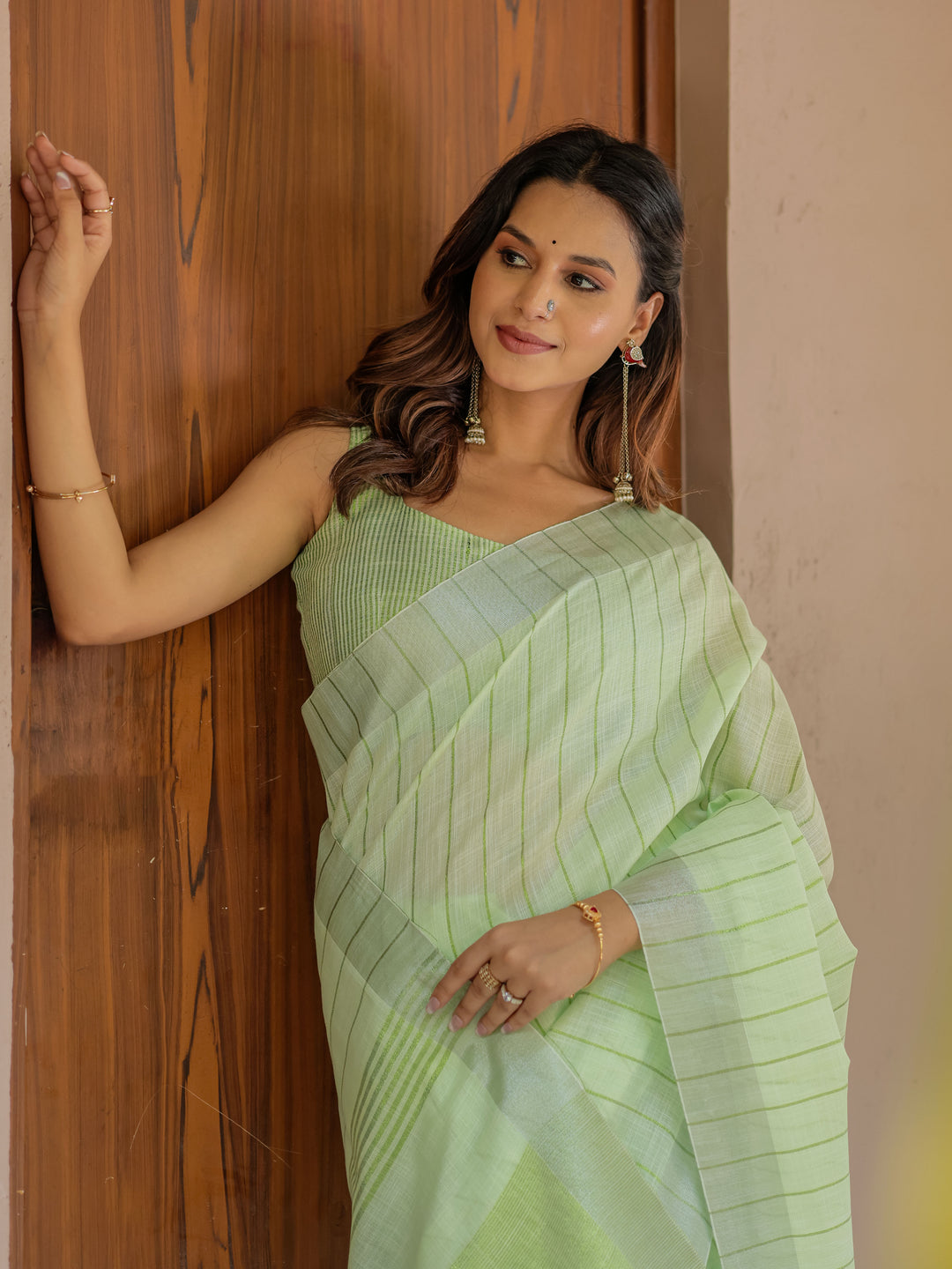 Mint Green Pure Handloom Cotton Saree with Striped Weaving & Tassel Detailing