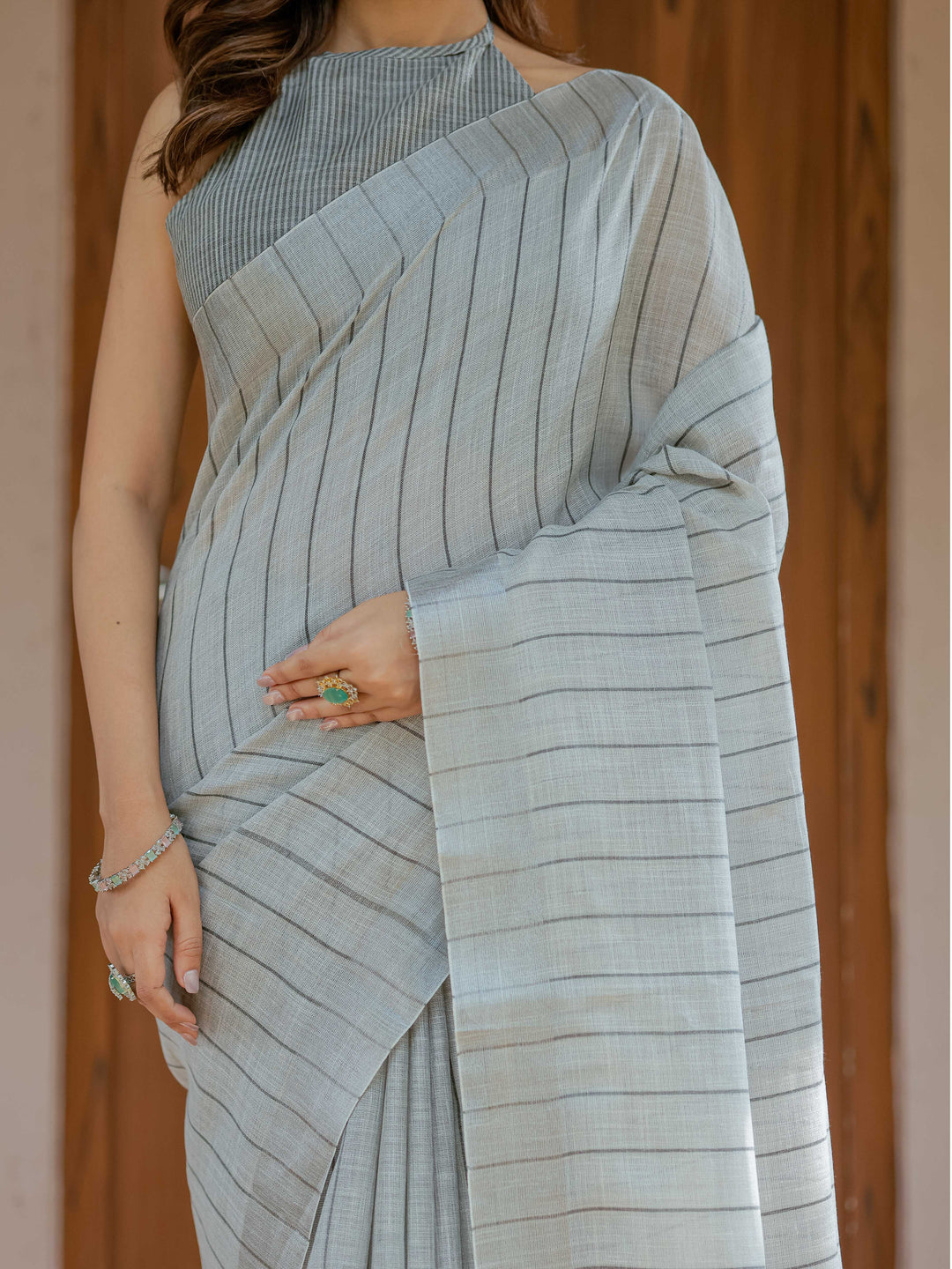 Elegant Ash Grey Handloom Cotton Saree with Minimal Striped Weaving & Tassel Detailing