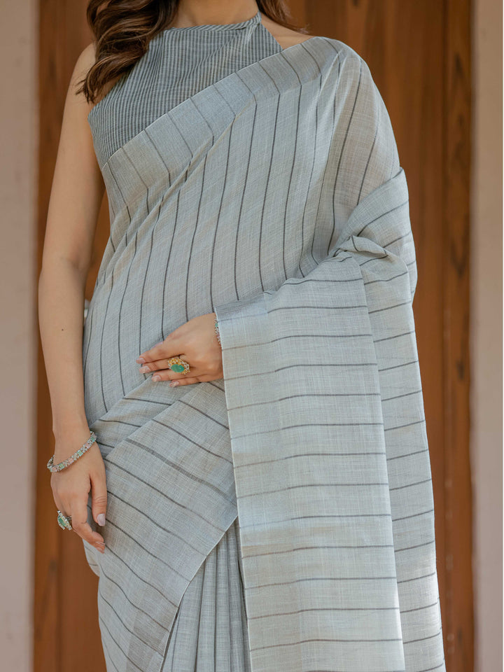 Elegant Ash Grey Handloom Cotton Saree with Minimal Striped Weaving & Tassel Detailing