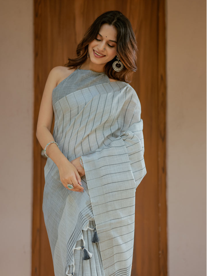 Elegant Ash Grey Handloom Cotton Saree with Minimal Striped Weaving & Tassel Detailing
