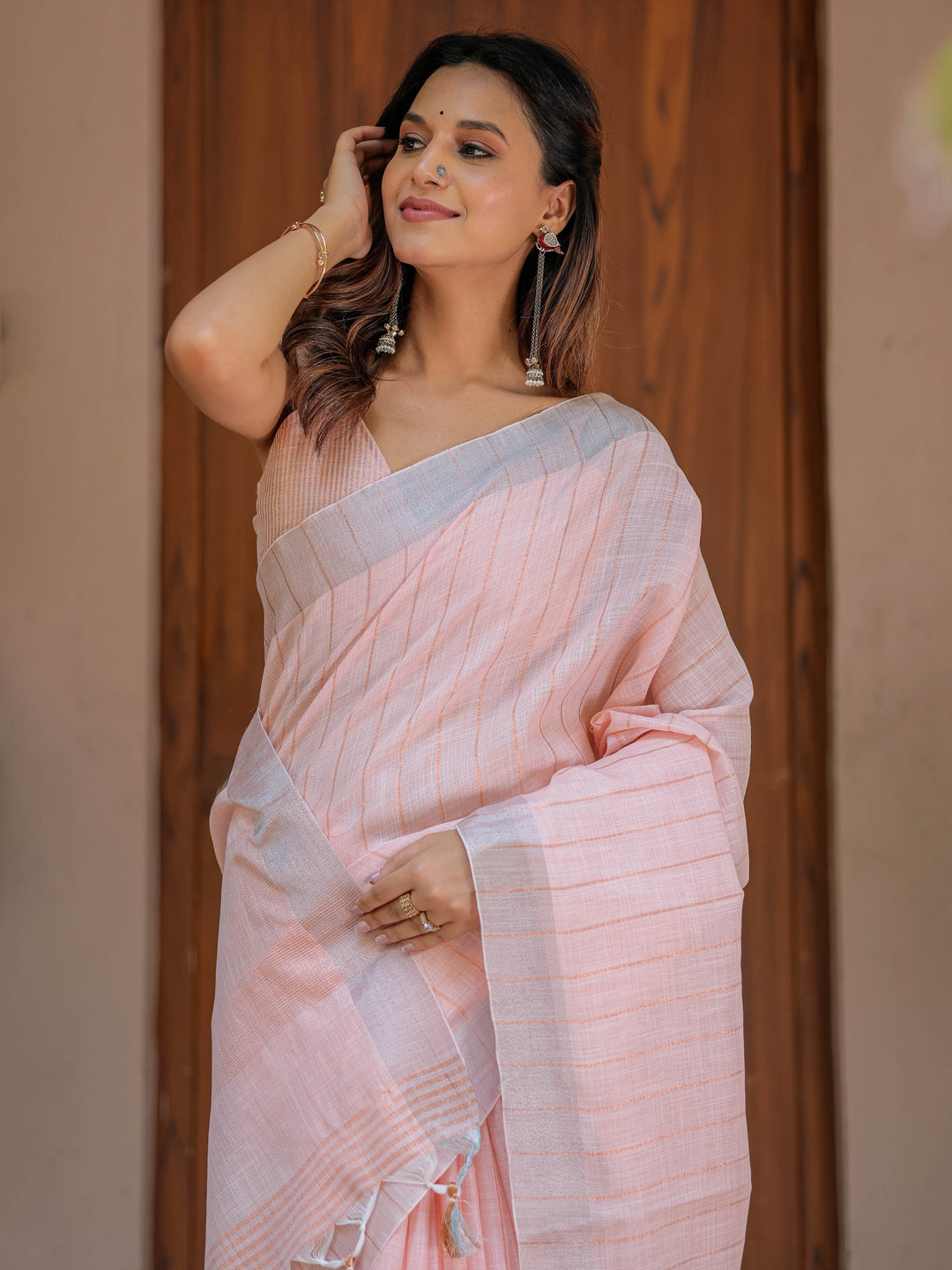 Soft Baby Pink Handloom Cotton Saree with Silver Border & Tassel Detailing