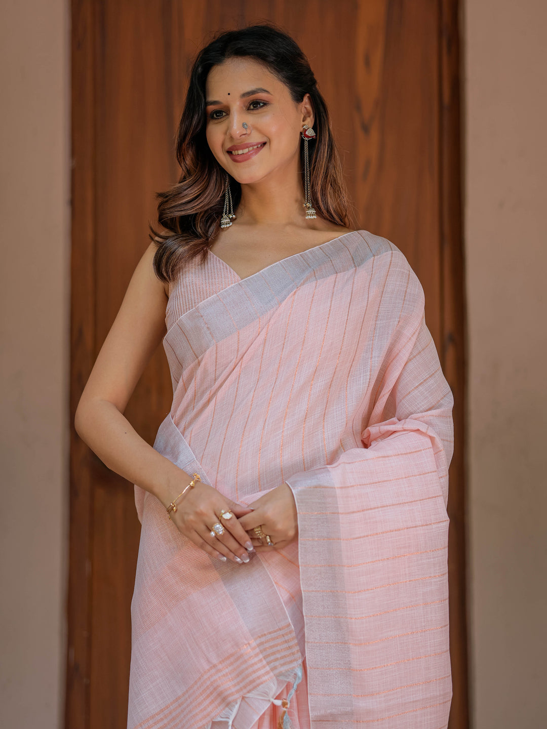 Soft Baby Pink Handloom Cotton Saree with Silver Border & Tassel Detailing