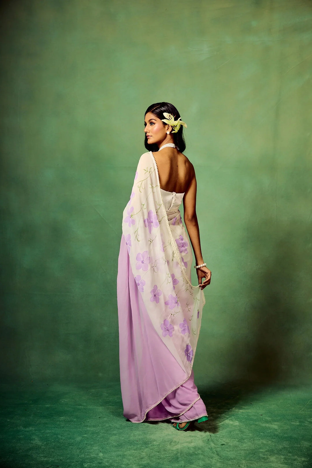 Lavender Bloom Pure Georgette Saree – Hand-Painted Floral Motifs with Sequins & Modal Satin Blouse