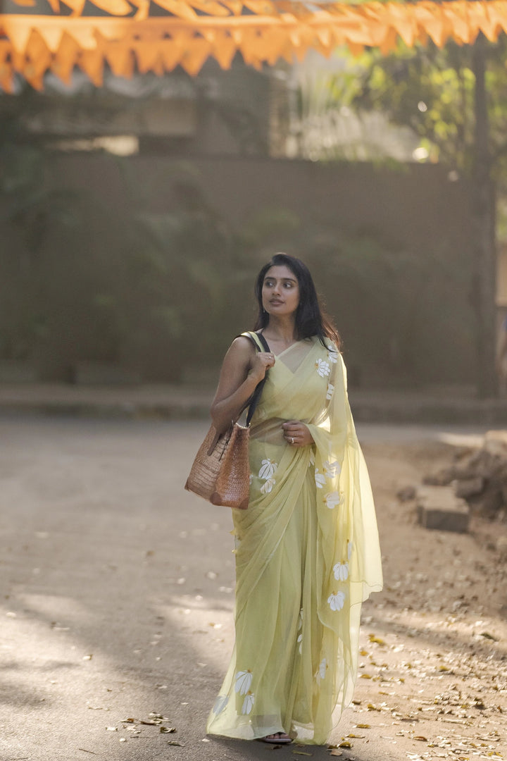 Lemon Yellow Hand-Painted Pure Georgette Saree with White Floral Motifs & Sequin Detailing | Modal Satin Blouse