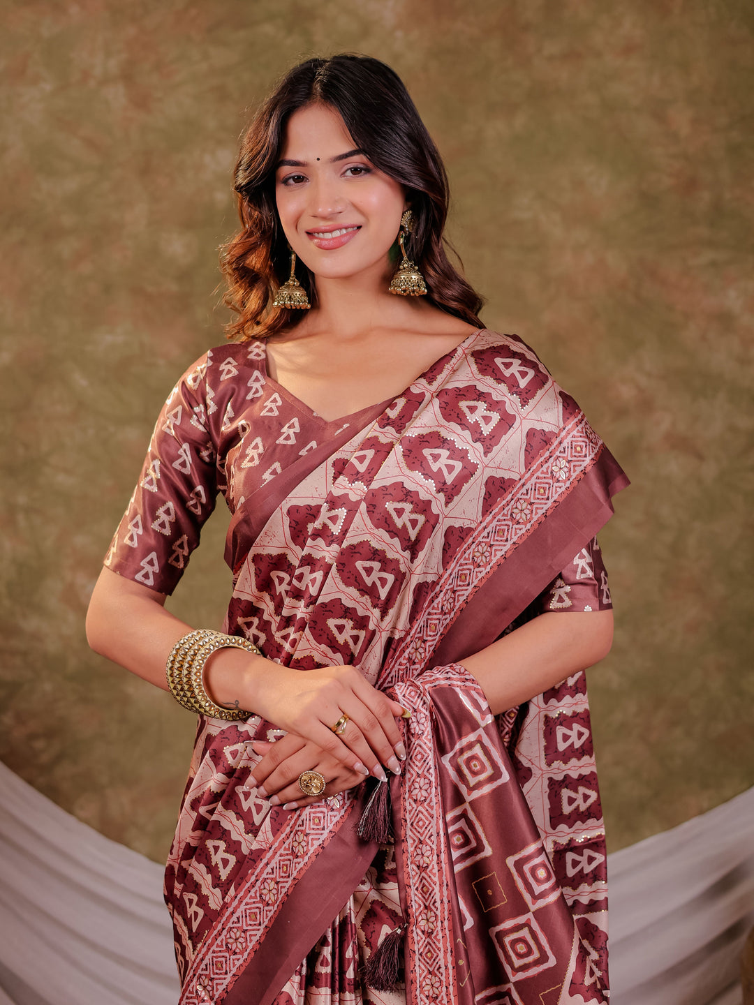 Coffee Brown Pure Chinnon Batik Printed Saree with Foil Detailing, Designer Border, Tassel Edges & Matching Blouse Piece