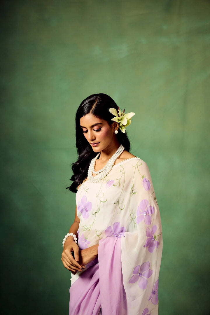 Lavender Bloom Pure Georgette Saree – Hand-Painted Floral Motifs with Sequins & Modal Satin Blouse