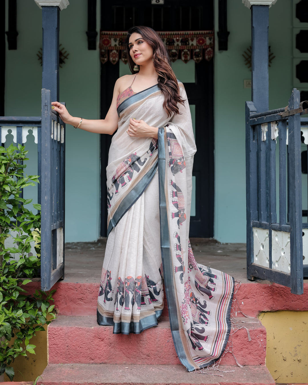 Ivory Pure Cotton Linen Saree with Elephant Motif and Tassel Detailing LINEN H 101110