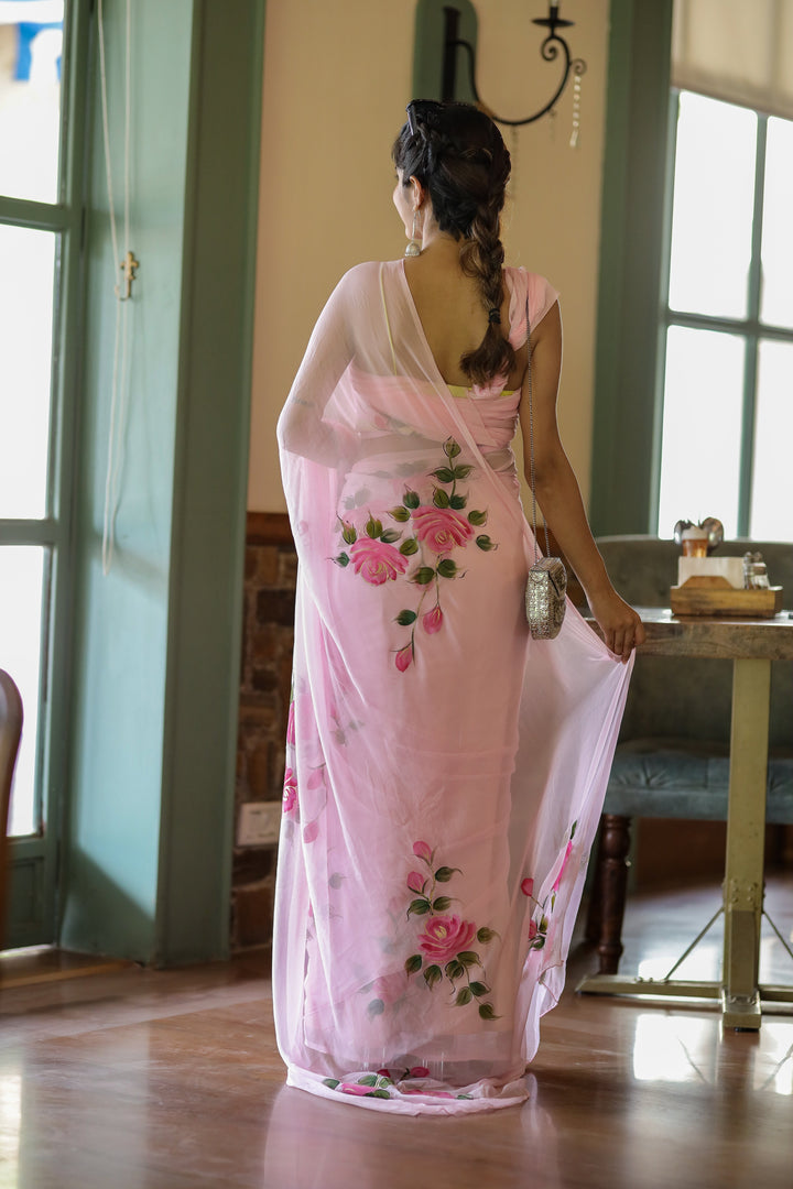 Baby Pink Pure Georgette Saree with Hand-Painted Pink Roses & Green Leaves – 5.5 Meters with Blouse Piece