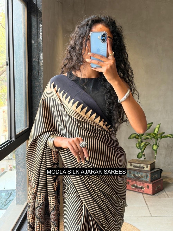 Black & Beige Modal Silk Ajrakh Printed Saree with Geometric Stripes, Heritage Pallu & Tassel Detailing