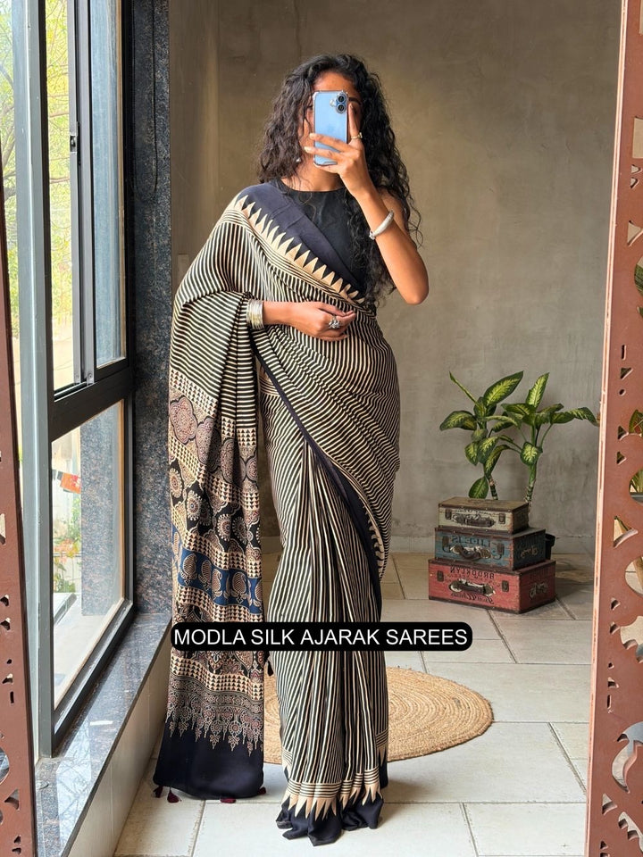 Black & Beige Modal Silk Ajrakh Printed Saree with Geometric Stripes, Heritage Pallu & Tassel Detailing