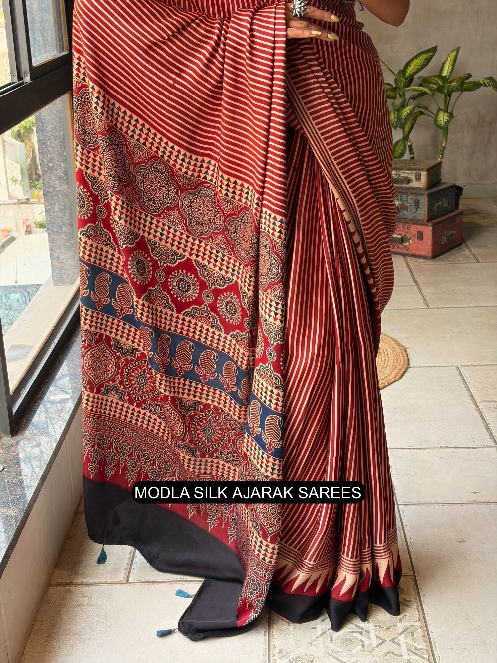 Red & Beige Modal Silk Ajrakh Printed Saree with Striped Design, Heritage Pallu & Tassel Detailing