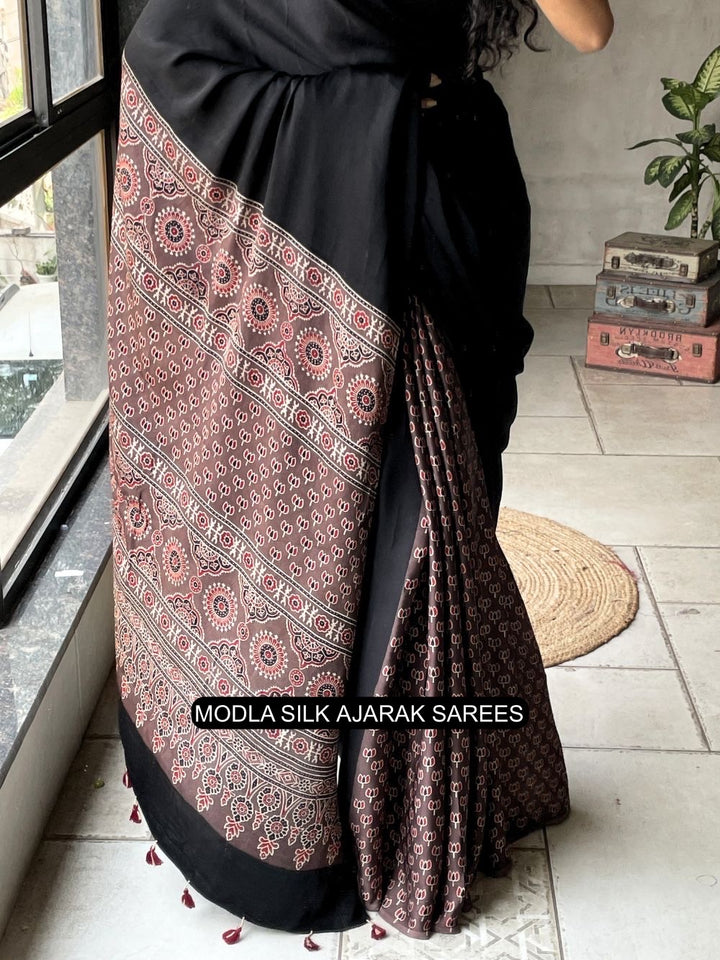 Black Modal Silk Ajrakh Printed Saree with Traditional Heritage Pallu, Intricate Ethnic Motifs & Tassel Detailing