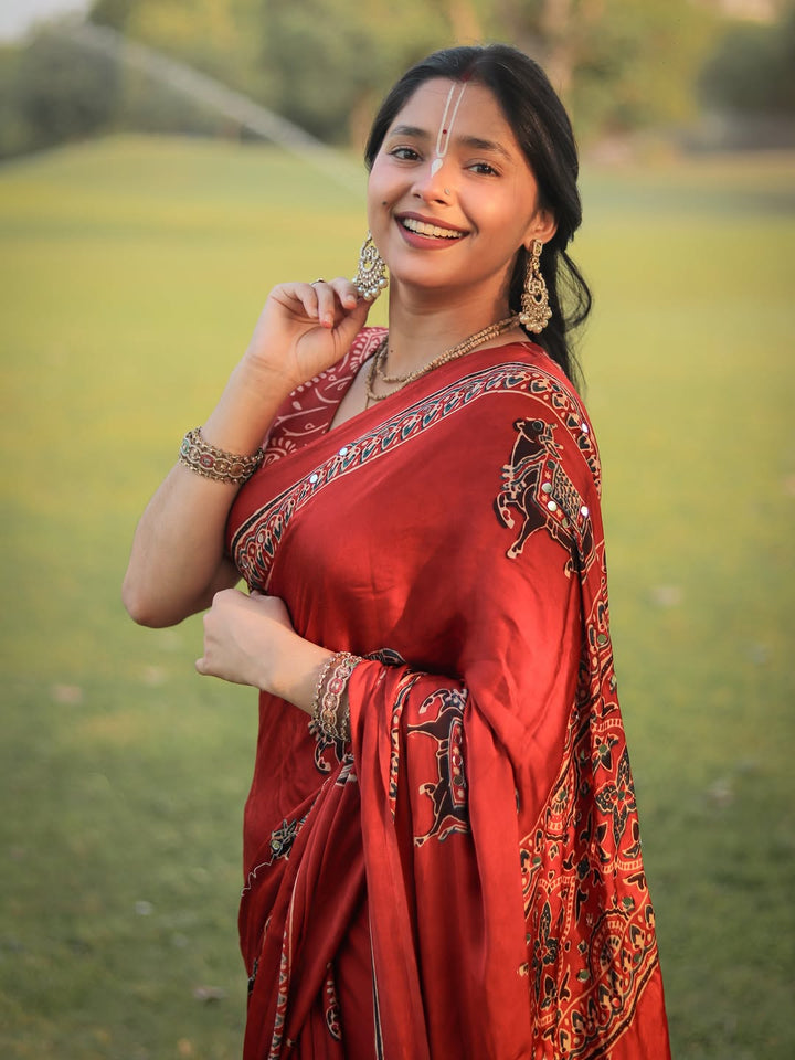 Red Modal Silk Ajrakh Printed Saree with Traditional Cow Motifs & Designer Pallu