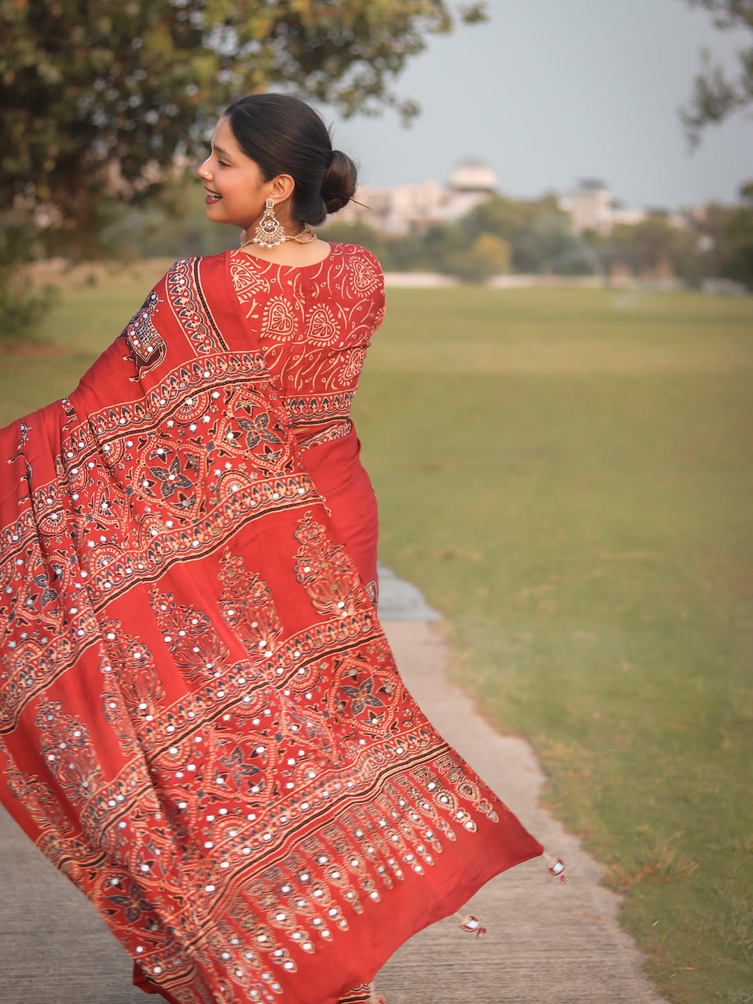 Red Modal Silk Ajrakh Printed Saree with Traditional Cow Motifs & Designer Pallu