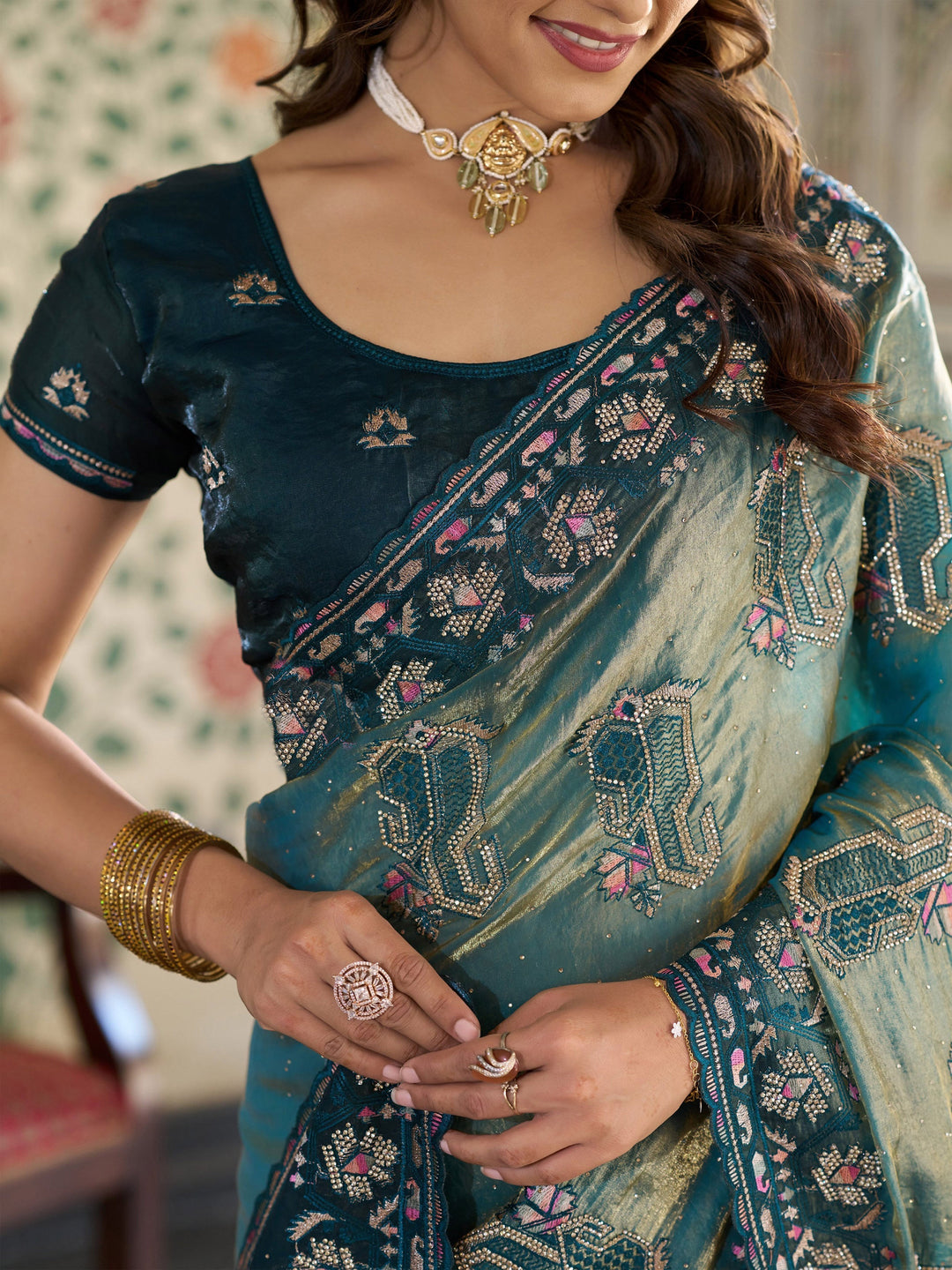 Teal Blue Fendy Satin Embroidered Saree with Ethnic Elephant Motifs & Zari Border | Designer Saree with Tassels & Heavy Embroidered Blouse