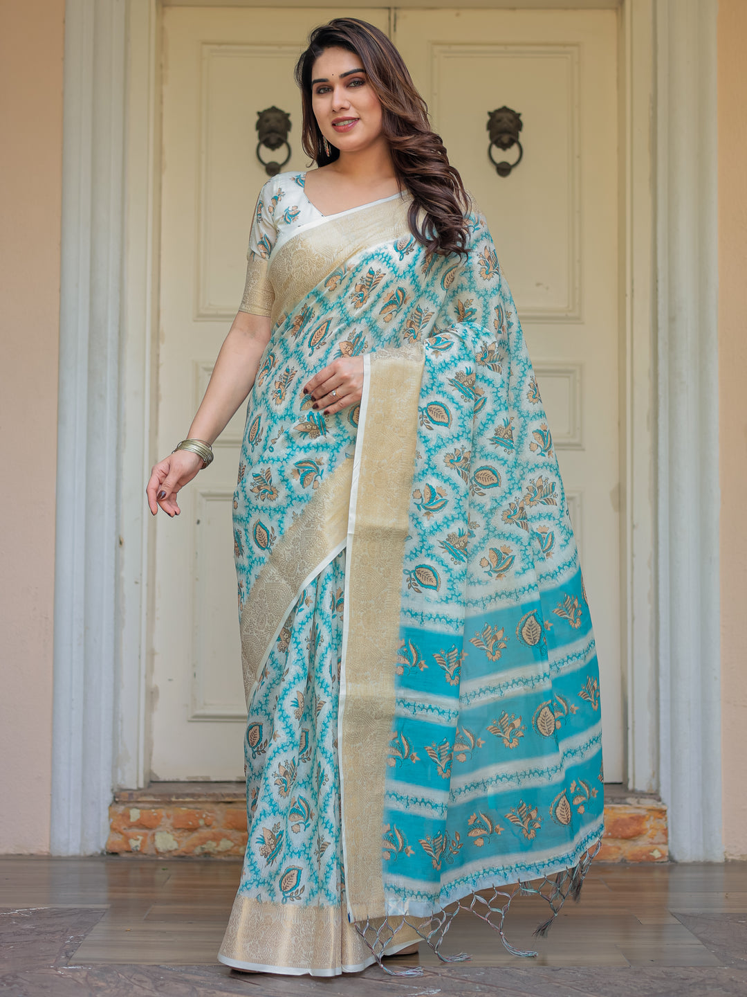 Turquoise Blue Handloom Cotton Printed Saree with Zari Border & Tassel Detailing – Traditional Ethnic Wear