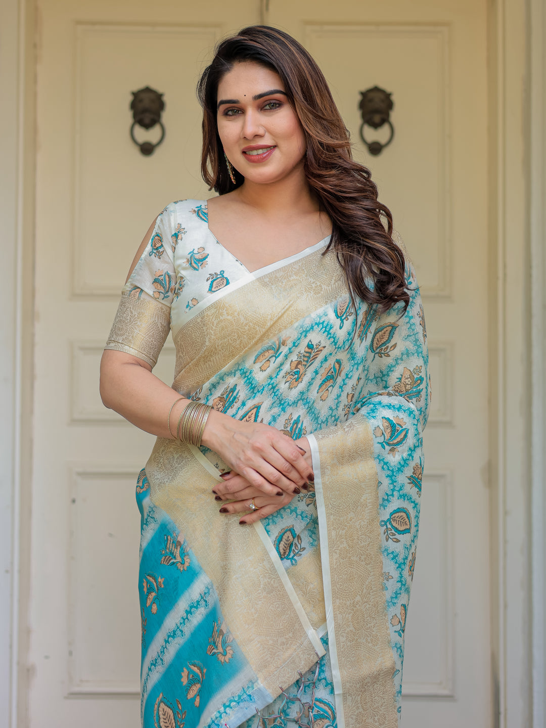 Turquoise Blue Handloom Cotton Printed Saree with Zari Border & Tassel Detailing – Traditional Ethnic Wear