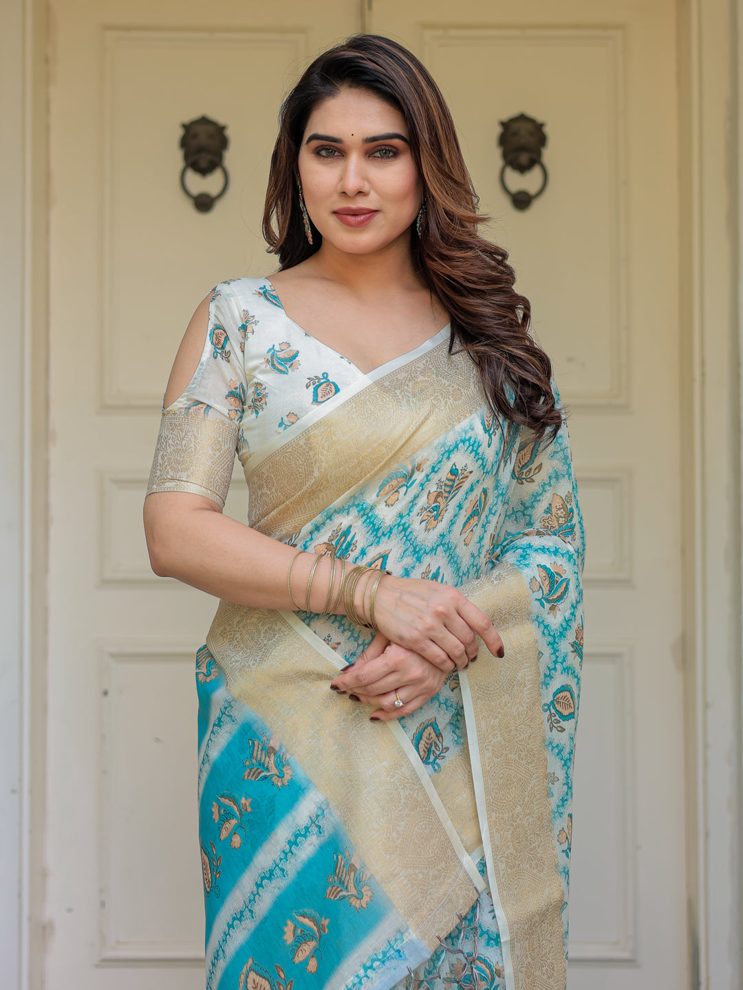 Turquoise Blue Handloom Cotton Printed Saree with Zari Border & Tassel Detailing – Traditional Ethnic Wear