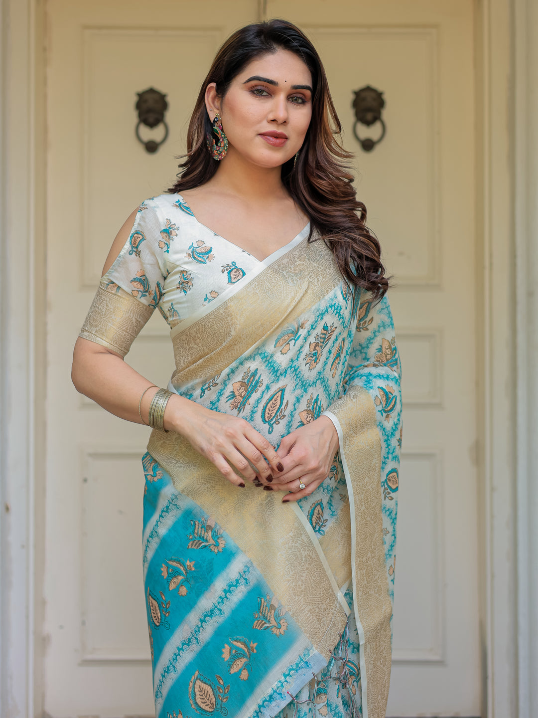 Turquoise Blue Handloom Cotton Printed Saree with Zari Border & Tassel Detailing – Traditional Ethnic Wear