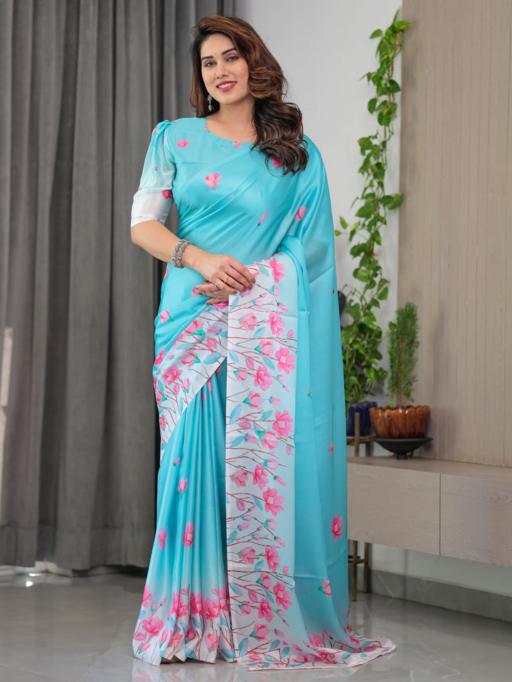 Aqua Blue Satin Georgette Pink Floral Printed Saree with Attached Blouse – Soft Pastel Designer Saree for Elegant & Festive Wear