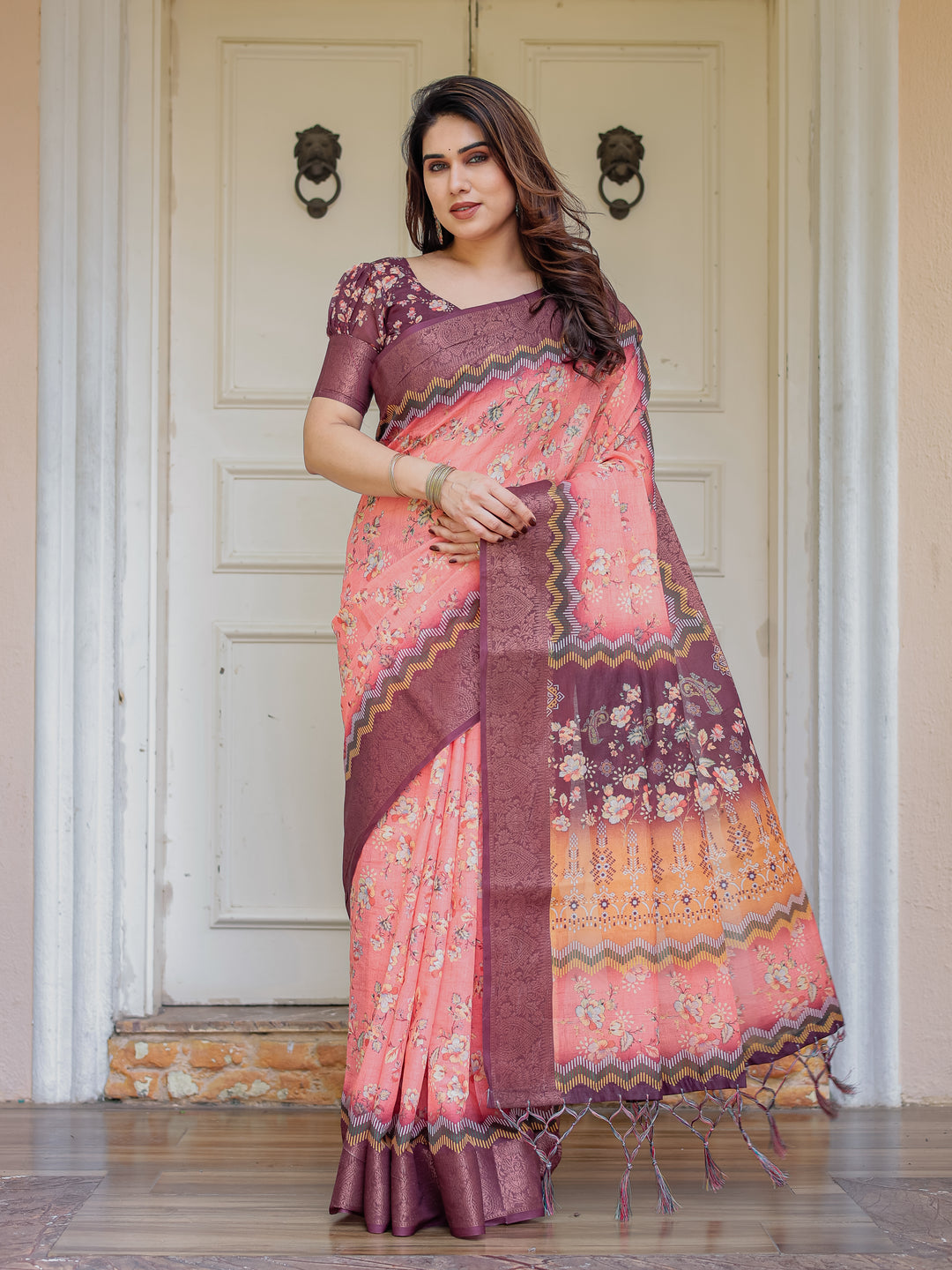 Peach Coral & Maroon Handloom Cotton Floral Printed Saree with Zari Border & Tassels – Festive Traditional Wear