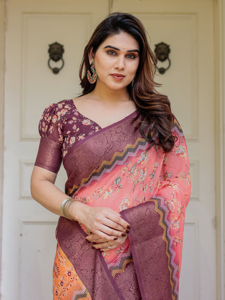 Peach Coral & Maroon Handloom Cotton Floral Printed Saree with Zari Border & Tassels – Festive Traditional Wear