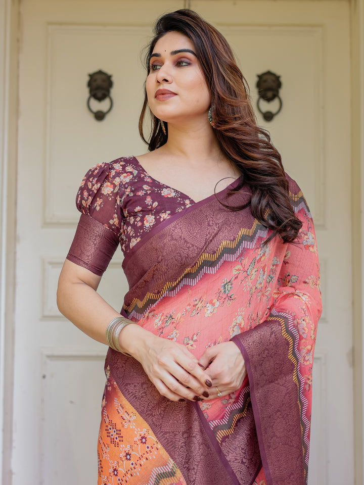 Peach Coral & Maroon Handloom Cotton Floral Printed Saree with Zari Border & Tassels – Festive Traditional Wear
