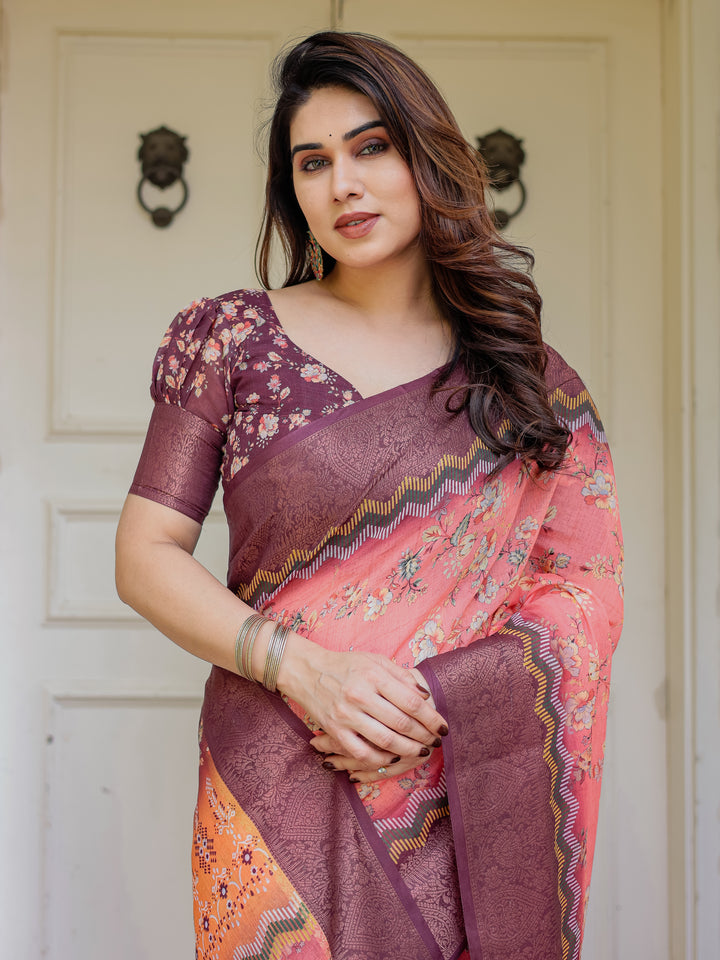 Peach Coral & Maroon Handloom Cotton Floral Printed Saree with Zari Border & Tassels – Festive Traditional Wear