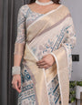 Ivory Beige Handloom Linen Saree with Teal Floral Buta & Paisley Border | Elegant Ethnic Printed Pallu & Zari Highlights | 5.5m Saree + 0.8m Blouse