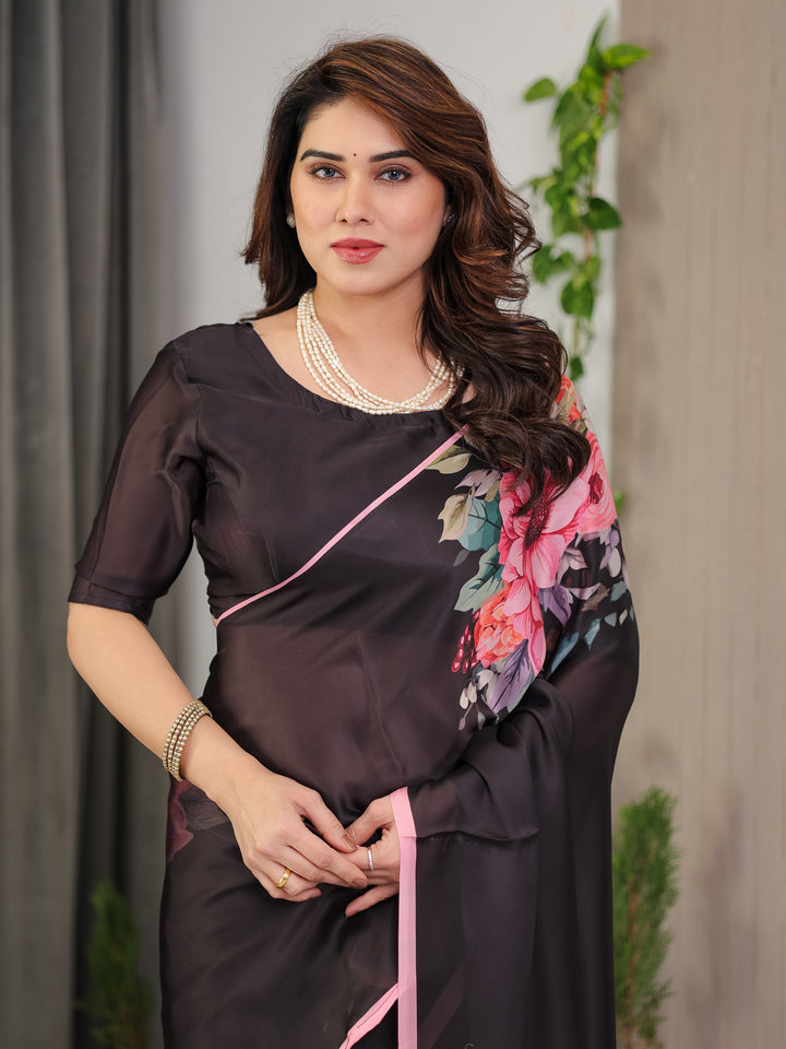 Black Satin Georgette Floral Printed Saree with Soft Pink Border & Attached Blouse – Elegant Designer Partywear Drape
