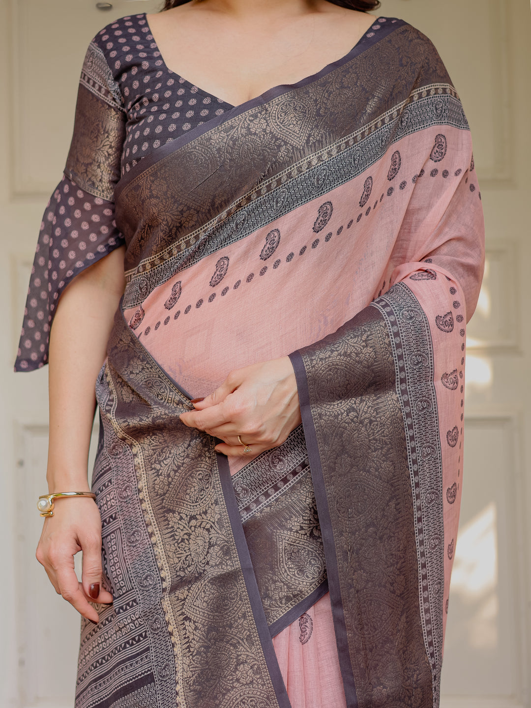 Blush Pink & Charcoal Grey Traditional Woven Saree with Antique Zari Border & Tassels – Elegant Festive Ethnic Wear
