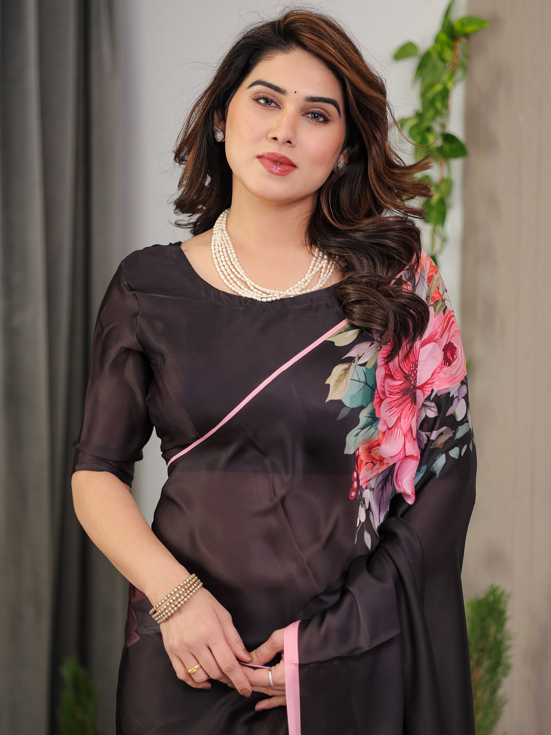 Black Satin Georgette Floral Printed Saree with Soft Pink Border & Attached Blouse – Elegant Designer Partywear Drape