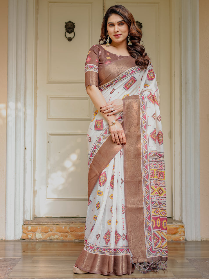 Ivory & Copper Brown Tribal Printed Saree with Rich Zari Border & Tassels – Ethnic Festive Wear