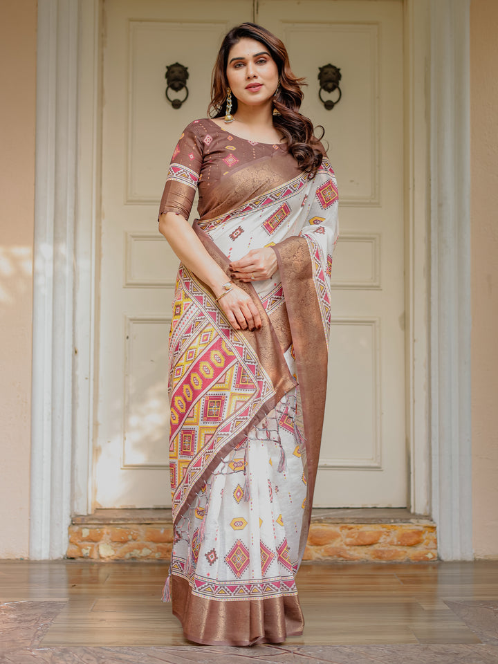 Ivory & Copper Brown Tribal Printed Saree with Rich Zari Border & Tassels – Ethnic Festive Wear