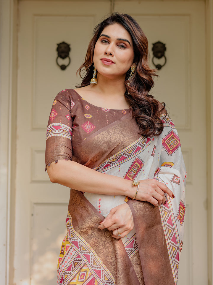 Ivory & Copper Brown Tribal Printed Saree with Rich Zari Border & Tassels – Ethnic Festive Wear