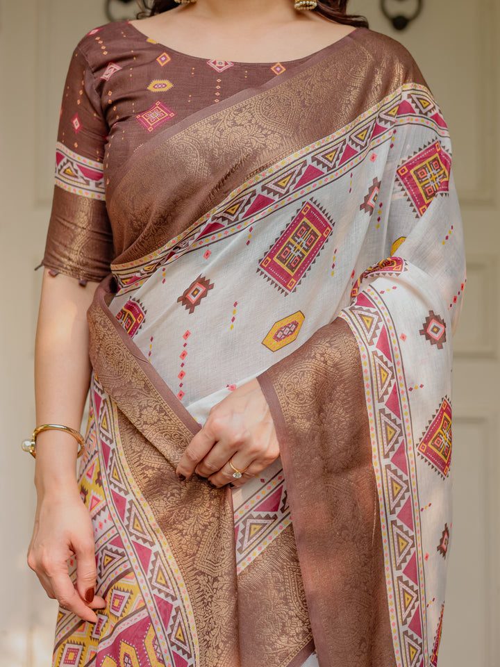Ivory & Copper Brown Tribal Printed Saree with Rich Zari Border & Tassels – Ethnic Festive Wear