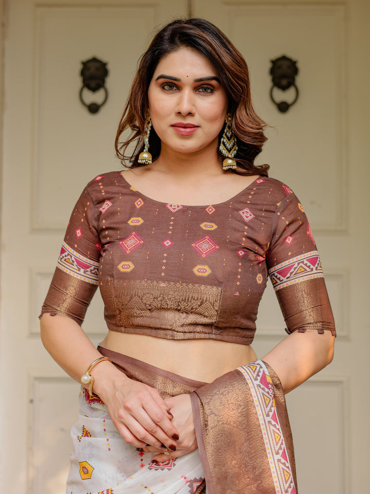 Ivory & Copper Brown Tribal Printed Saree with Rich Zari Border & Tassels – Ethnic Festive Wear